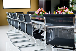 Board Room full of chairs at a table